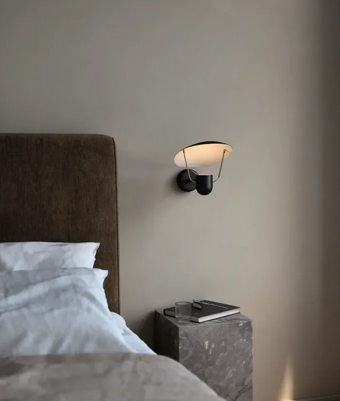 Black Wall Light with Reflective Shade and Brass Detail